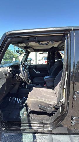 used 2015 Jeep Wrangler Unlimited car, priced at $11,477