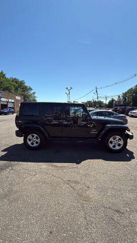 used 2015 Jeep Wrangler Unlimited car, priced at $11,477