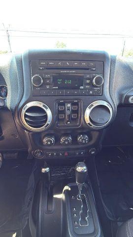 used 2015 Jeep Wrangler Unlimited car, priced at $11,477