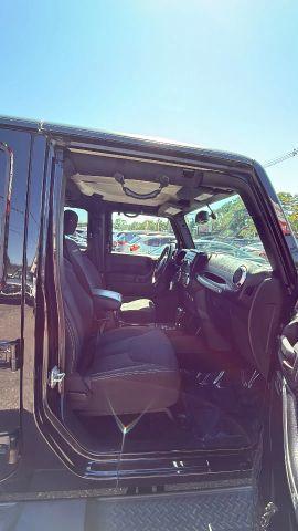 used 2015 Jeep Wrangler Unlimited car, priced at $11,477