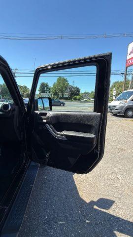 used 2015 Jeep Wrangler Unlimited car, priced at $11,477