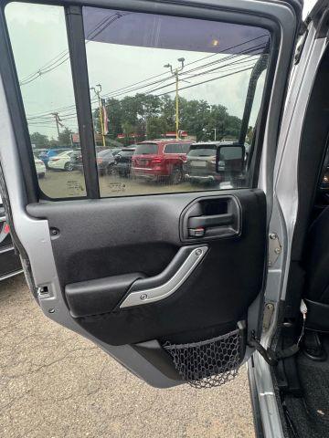 used 2014 Jeep Wrangler Unlimited car, priced at $13,847