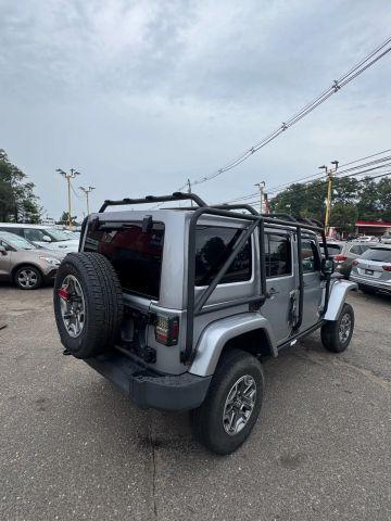 used 2014 Jeep Wrangler Unlimited car, priced at $13,847