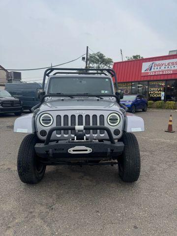 used 2014 Jeep Wrangler Unlimited car, priced at $13,847