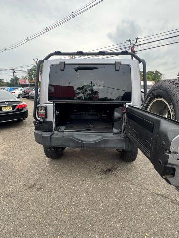 used 2014 Jeep Wrangler Unlimited car, priced at $13,847