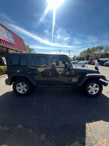 used 2015 Jeep Wrangler Unlimited car, priced at $13,687