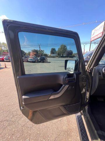 used 2015 Jeep Wrangler Unlimited car, priced at $13,687