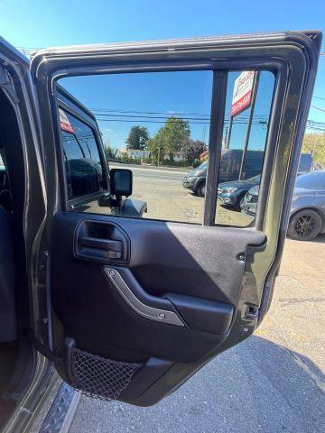 used 2015 Jeep Wrangler Unlimited car, priced at $13,687
