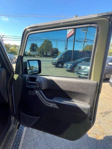 used 2015 Jeep Wrangler Unlimited car, priced at $13,687