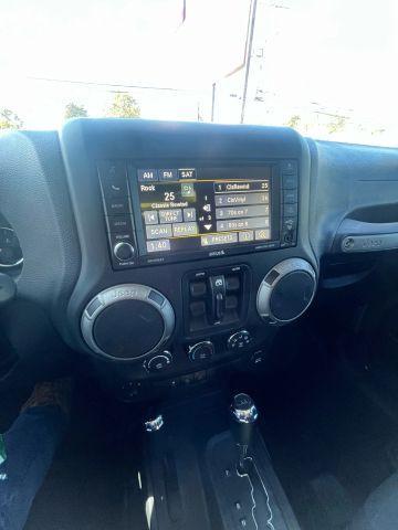 used 2015 Jeep Wrangler Unlimited car, priced at $13,687