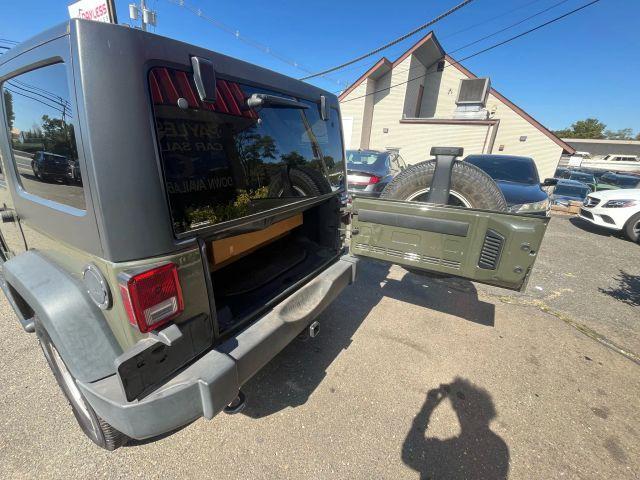used 2015 Jeep Wrangler Unlimited car, priced at $13,687