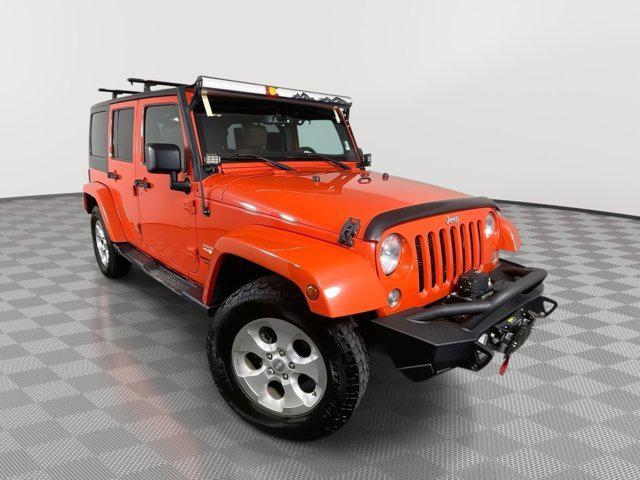 used 2015 Jeep Wrangler Unlimited car, priced at $21,995