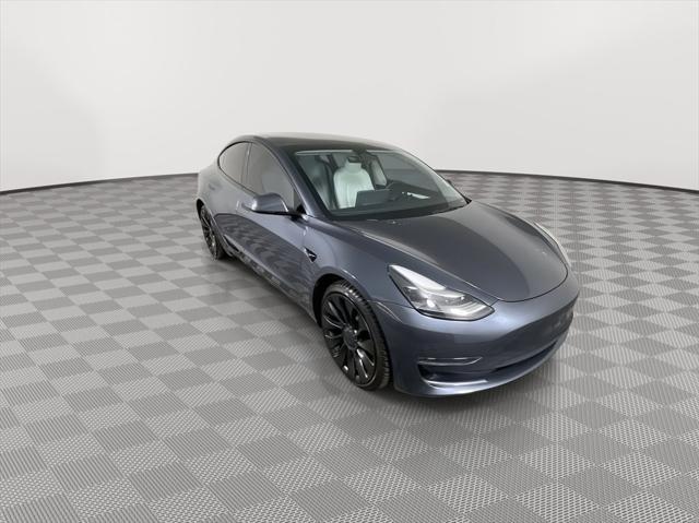 used 2023 Tesla Model 3 car, priced at $32,995