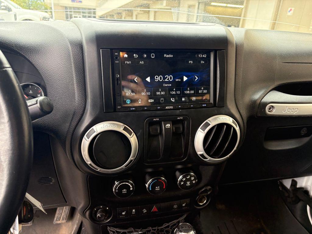 used 2014 Jeep Wrangler car, priced at $17,499