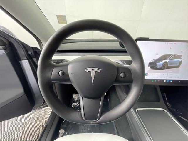 used 2024 Tesla Model Y car, priced at $42,995