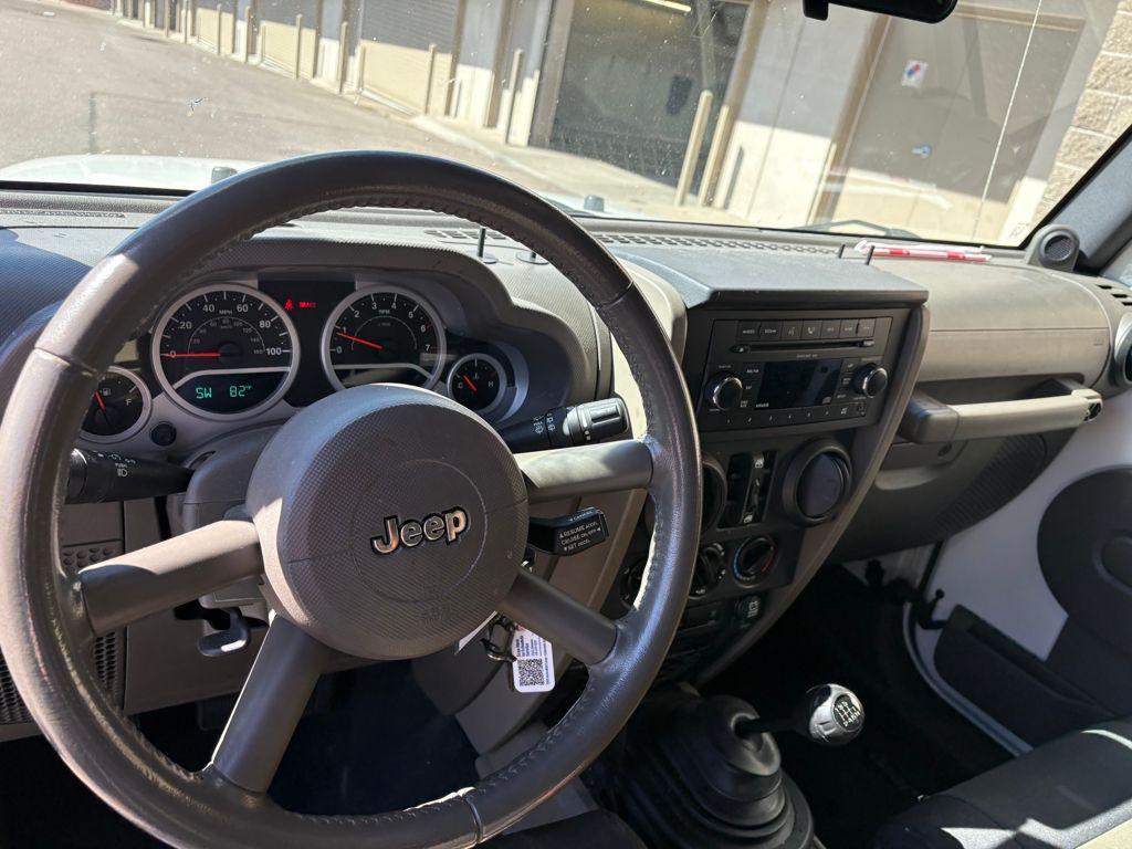 used 2009 Jeep Wrangler Unlimited car, priced at $12,995