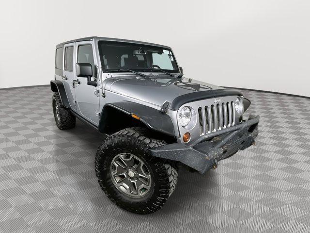 used 2013 Jeep Wrangler Unlimited car, priced at $17,699