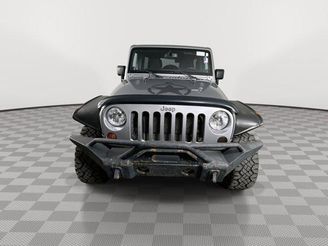 used 2013 Jeep Wrangler Unlimited car, priced at $17,699