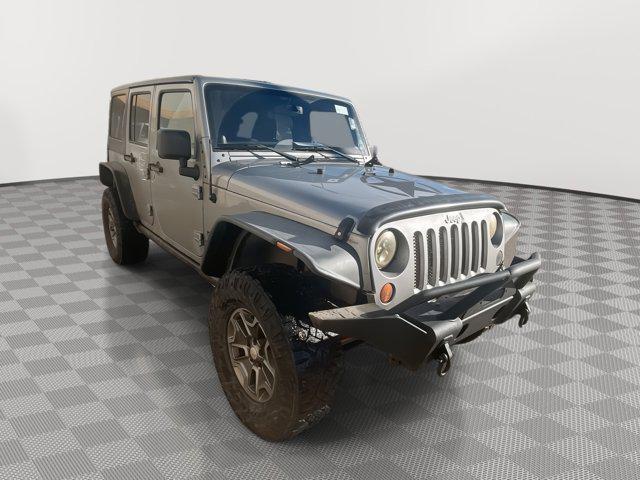 used 2013 Jeep Wrangler Unlimited car, priced at $18,495