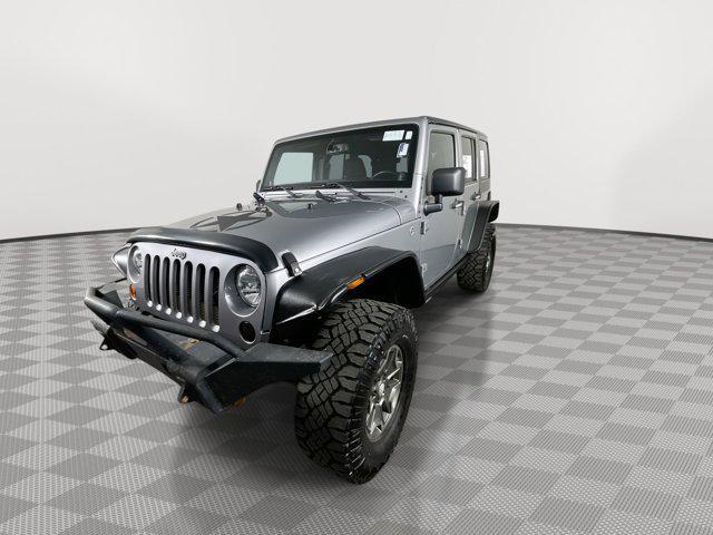 used 2013 Jeep Wrangler Unlimited car, priced at $17,699