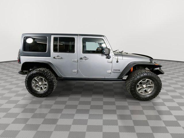 used 2013 Jeep Wrangler Unlimited car, priced at $17,699