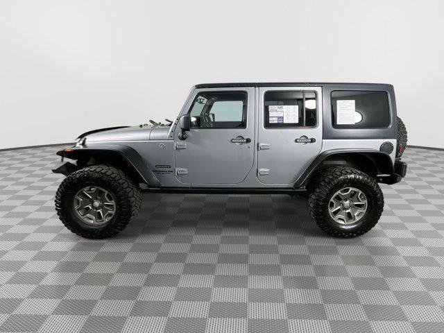 used 2013 Jeep Wrangler Unlimited car, priced at $17,699