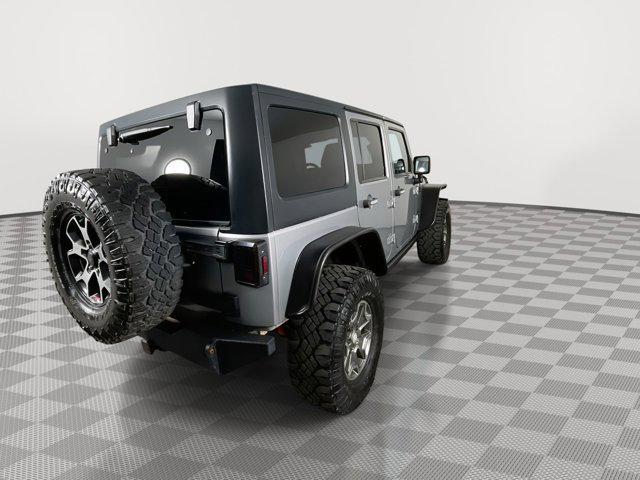 used 2013 Jeep Wrangler Unlimited car, priced at $17,699