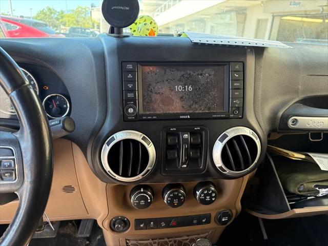 used 2015 Jeep Wrangler Unlimited car, priced at $19,495