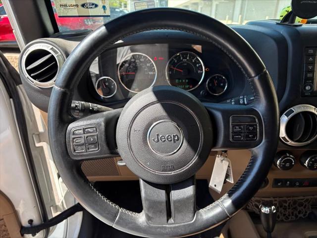 used 2015 Jeep Wrangler Unlimited car, priced at $19,495