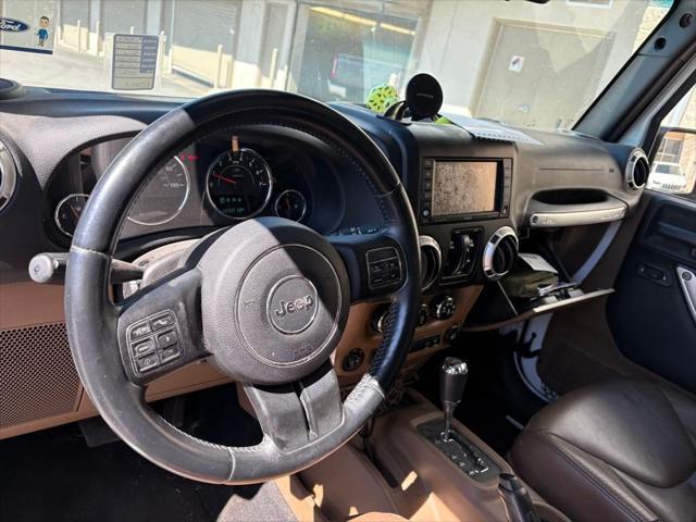 used 2015 Jeep Wrangler Unlimited car, priced at $19,495
