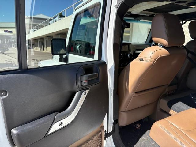 used 2015 Jeep Wrangler Unlimited car, priced at $19,495