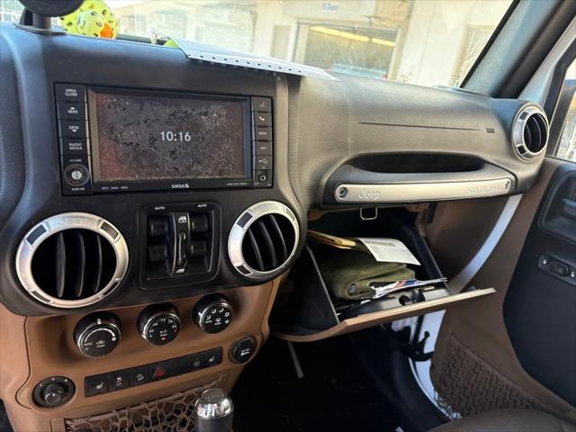 used 2015 Jeep Wrangler Unlimited car, priced at $19,495