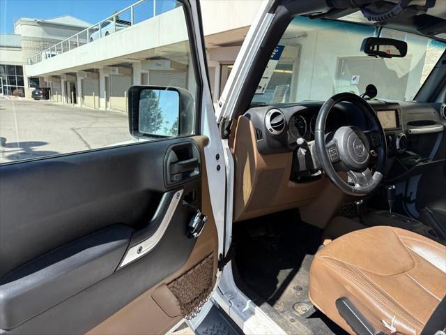 used 2015 Jeep Wrangler Unlimited car, priced at $19,495