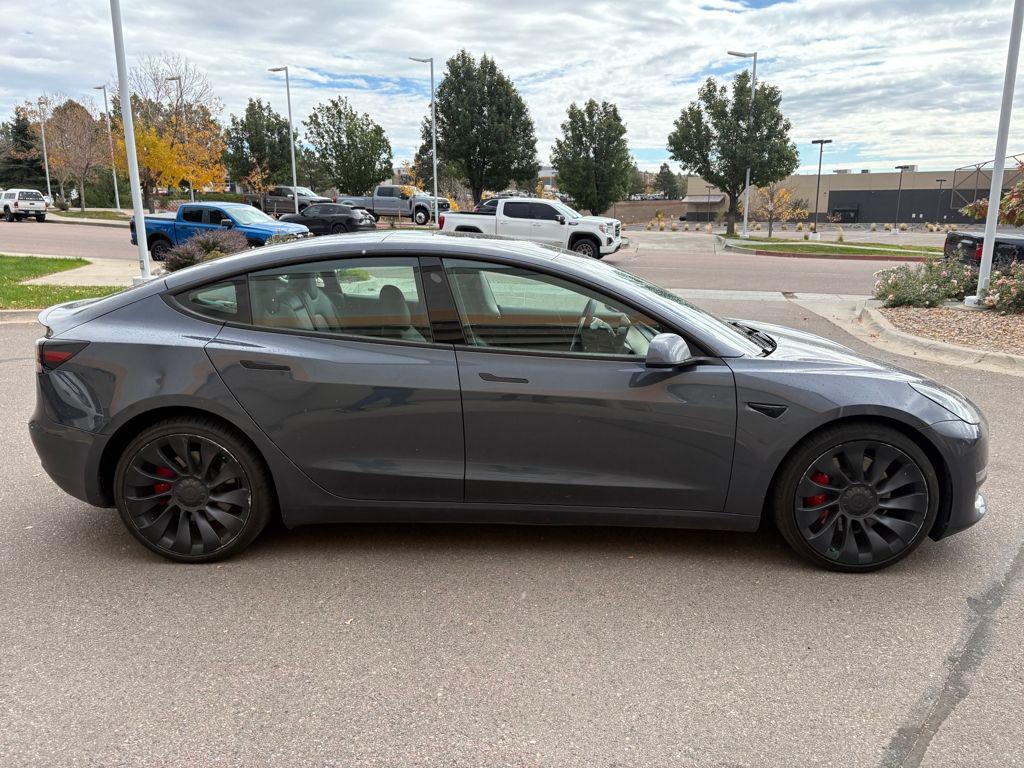 used 2023 Tesla Model 3 car, priced at $33,499