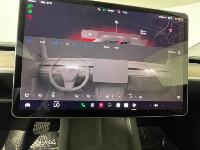 used 2023 Tesla Model Y car, priced at $30,899