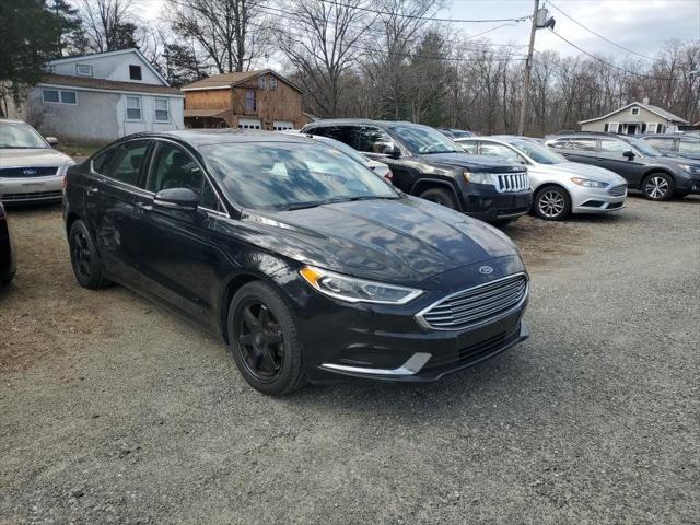 used 2018 Ford Fusion car, priced at $13,299