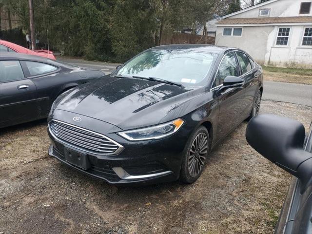 used 2018 Ford Fusion car, priced at $11,399