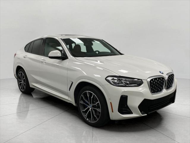 used 2022 BMW X4 car, priced at $42,652