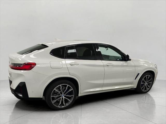 used 2022 BMW X4 car, priced at $42,652