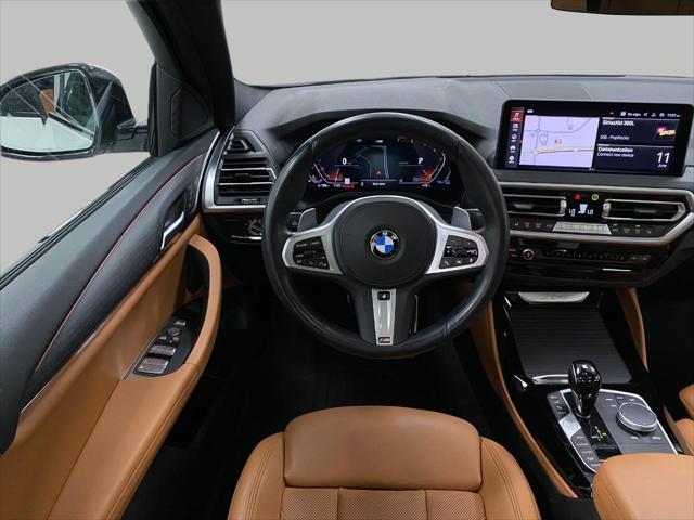 used 2022 BMW X4 car, priced at $42,652