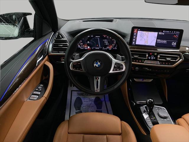 used 2023 BMW X4 car, priced at $54,956