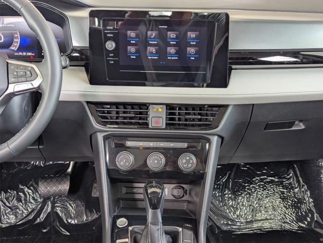 new 2025 Volkswagen Taos car, priced at $27,011