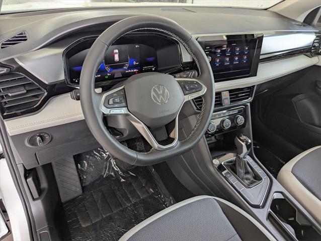 new 2025 Volkswagen Taos car, priced at $27,011