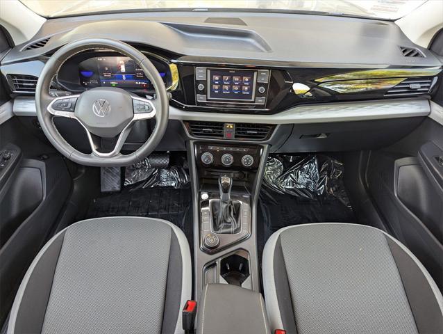used 2024 Volkswagen Taos car, priced at $23,196