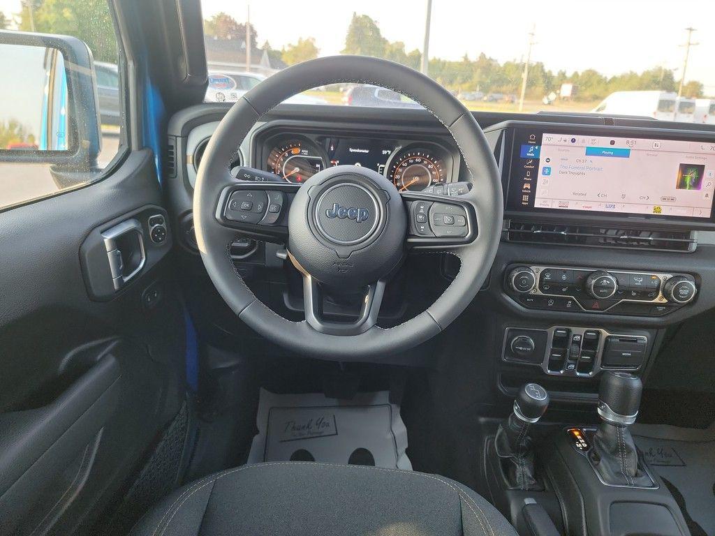used 2025 Jeep Wrangler car, priced at $39,969
