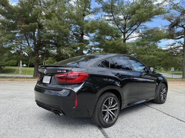 used 2015 BMW X6 M car, priced at $24,000