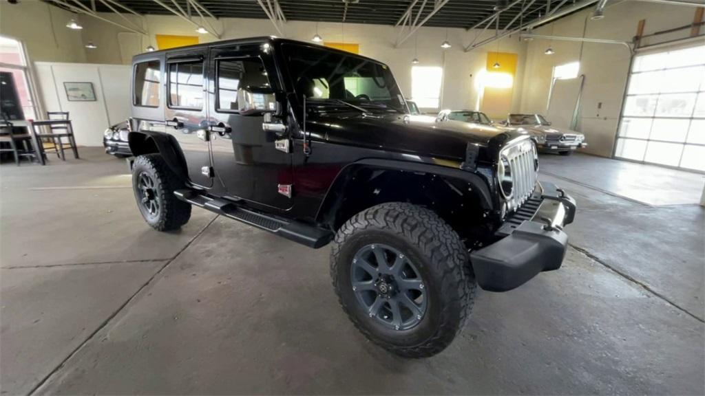 used 2016 Jeep Wrangler Unlimited car, priced at $24,211