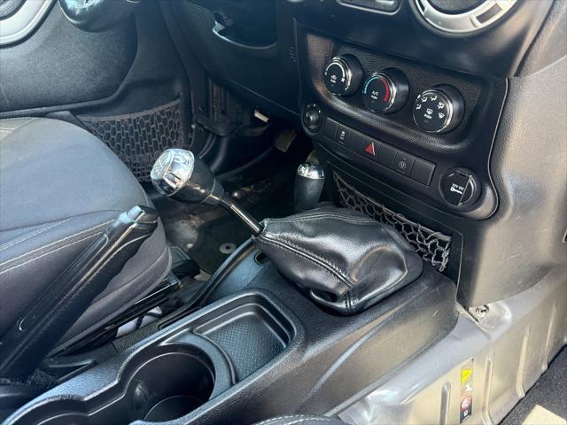 used 2014 Jeep Wrangler car, priced at $13,400