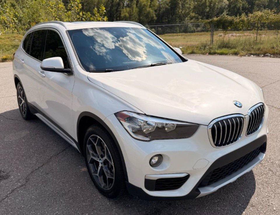 used 2018 BMW X1 car, priced at $14,946