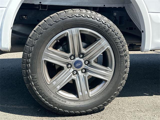 used 2018 Ford F-150 car, priced at $25,956